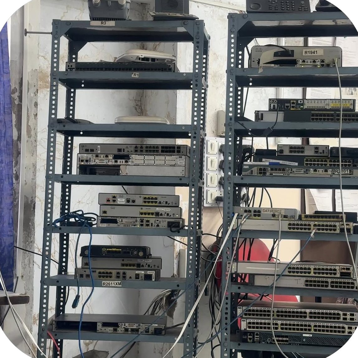 The Cisco lab rack at Attila Technologies with 1941, 2801 and 2611XM routers